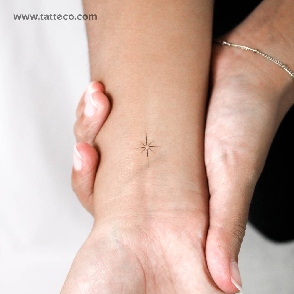Fine line style north star temporary tattoo done on the wrist.