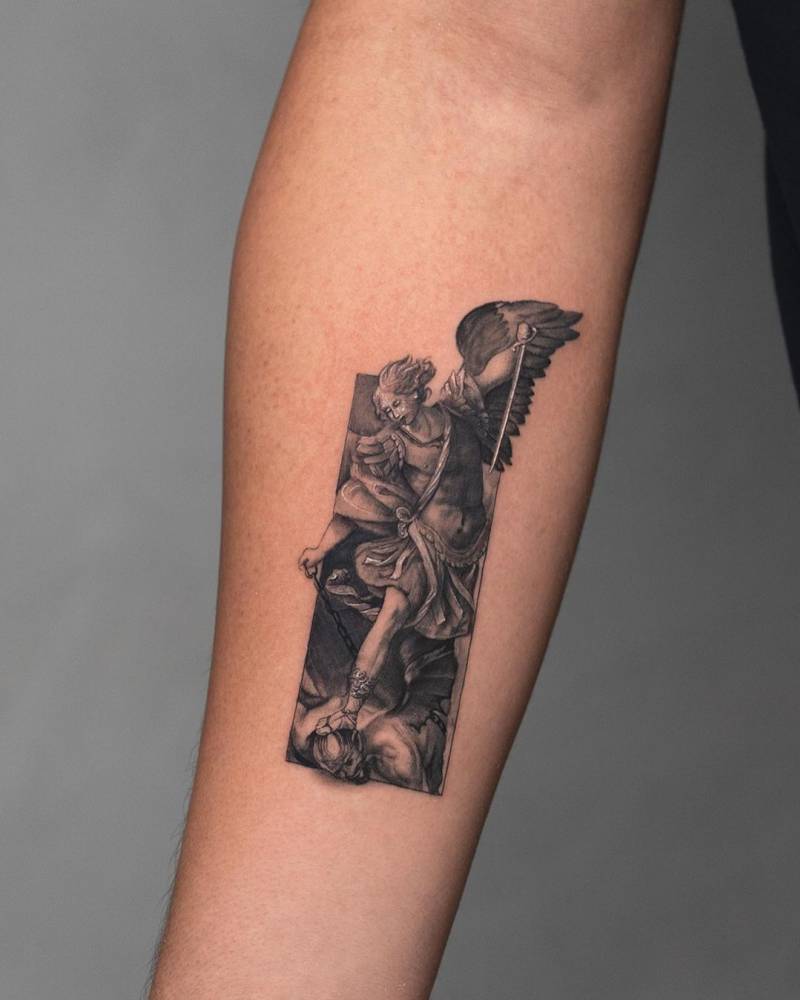 'The Archangel Michael Defeating Satan' tattooed on the inner forearm.
