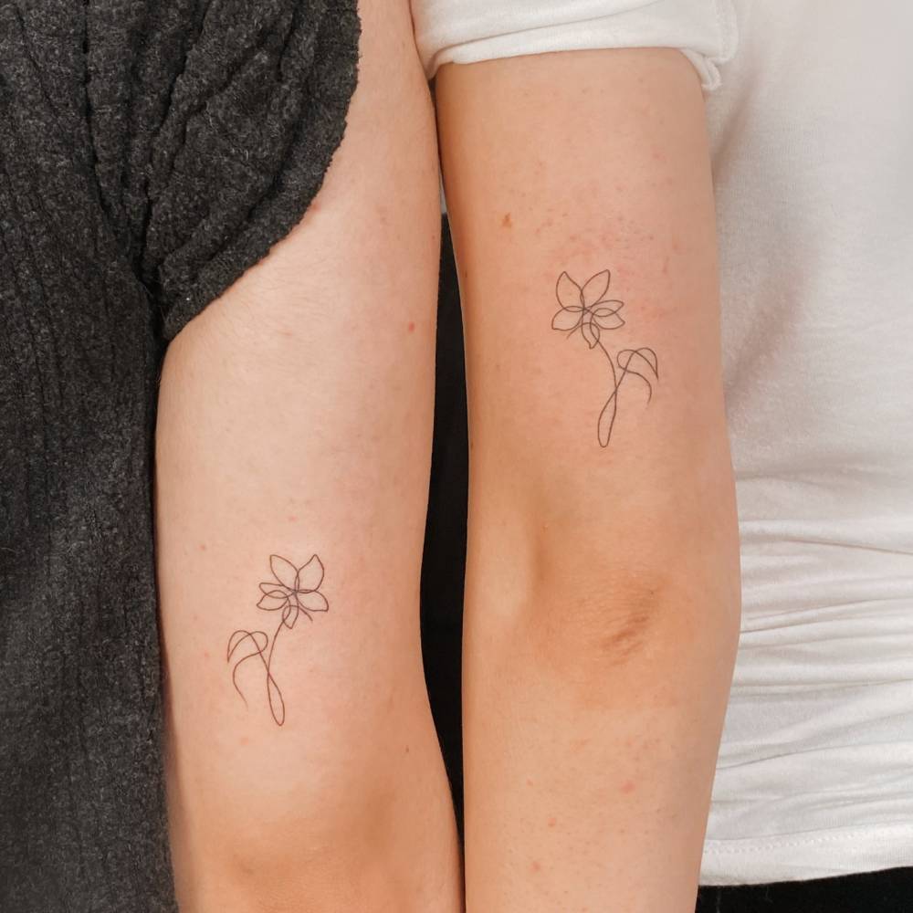 Matching BTS flower tattoo for best friends.