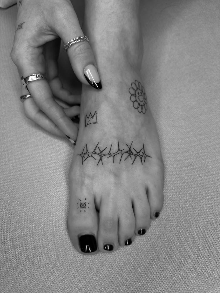 Foot composition tattoos.