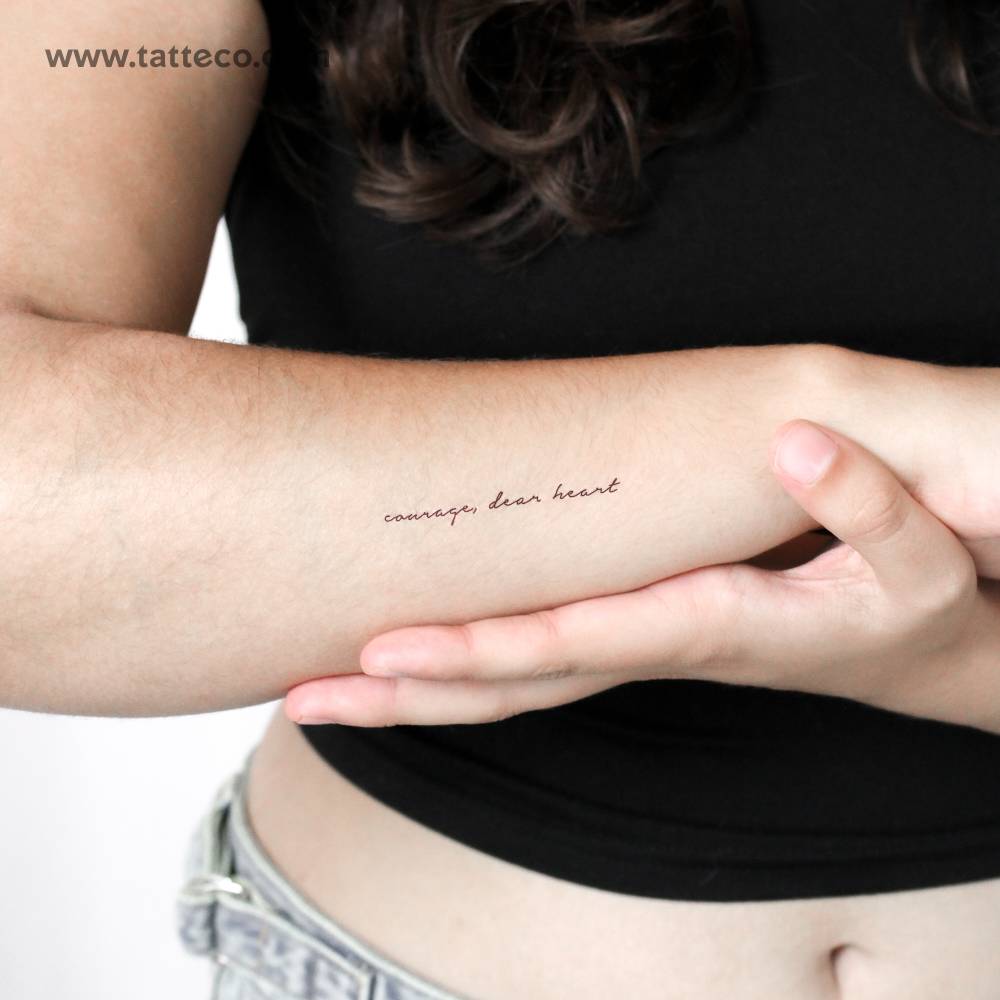 "Courage, dear heart" temporary lettering tattoo.