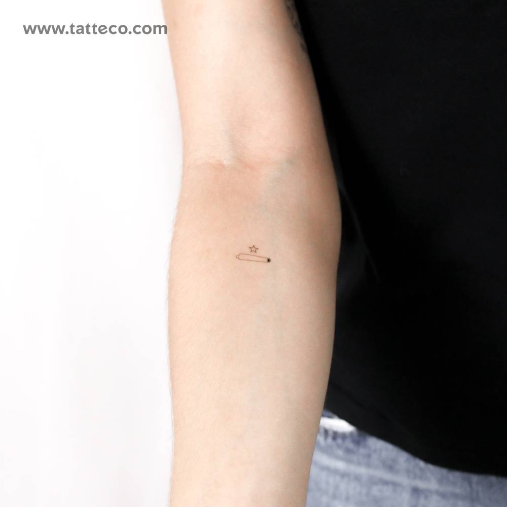 Little 'Come And Take It' temporary tattoo located on the inner forearm.