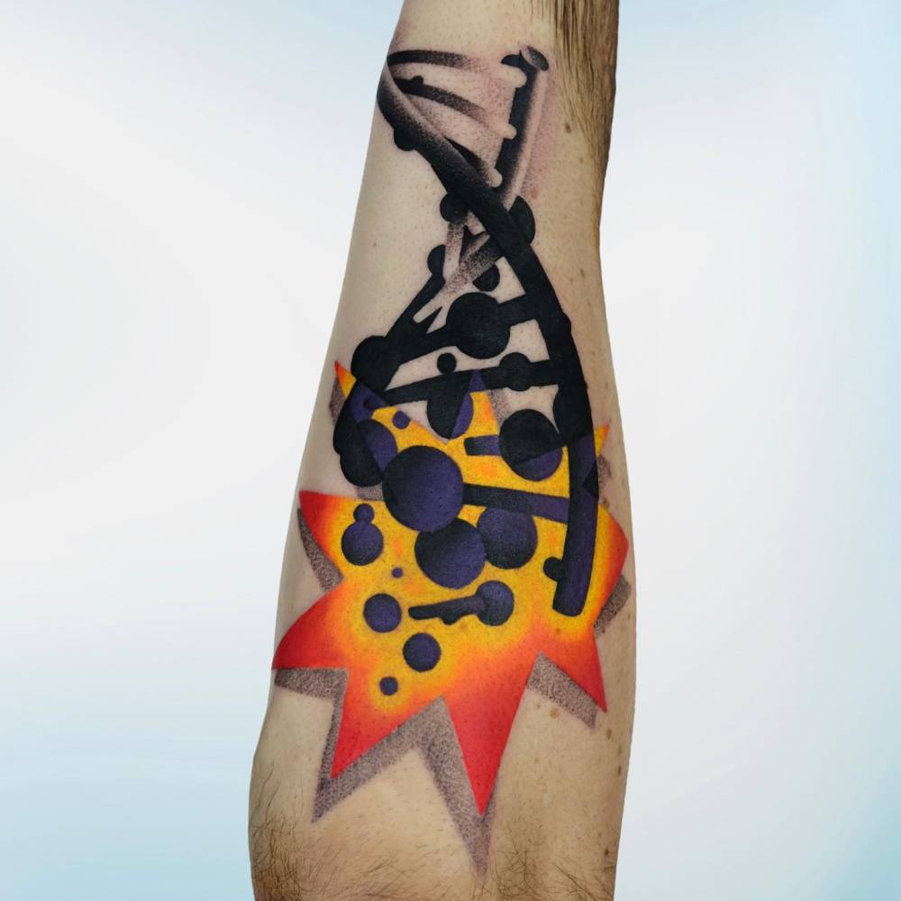 Pop art style DNA tattoo located on the inner forearm.