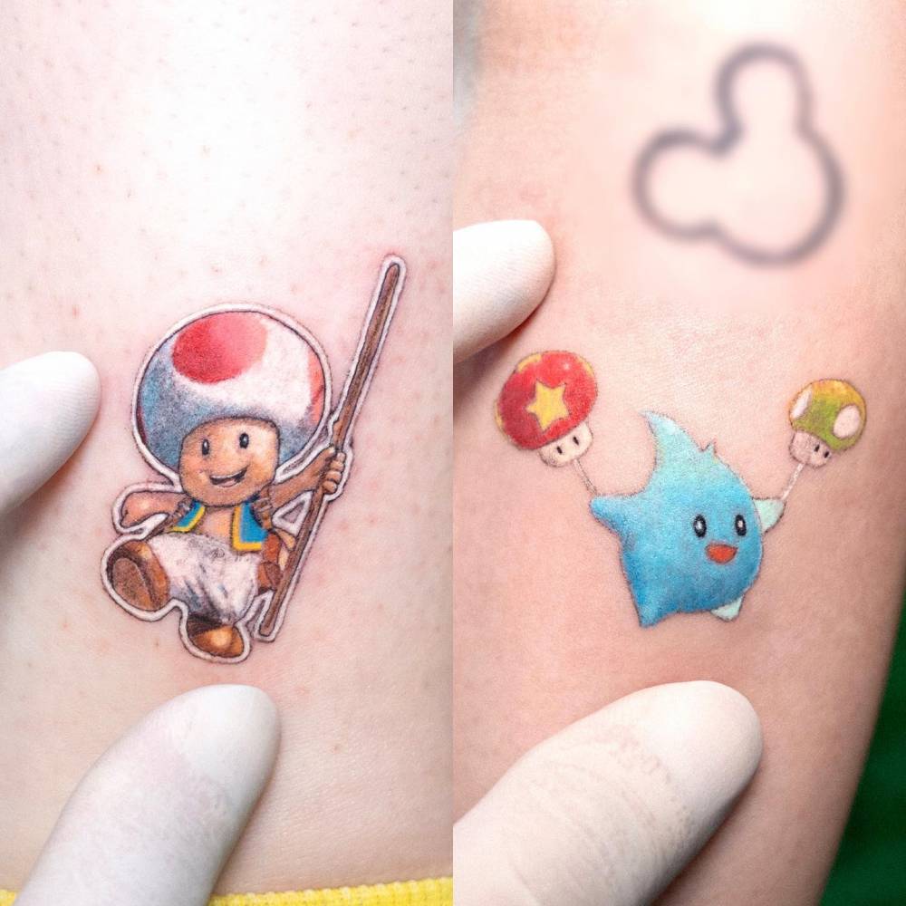 Cartoon style Toad and Lumalee tattoos.