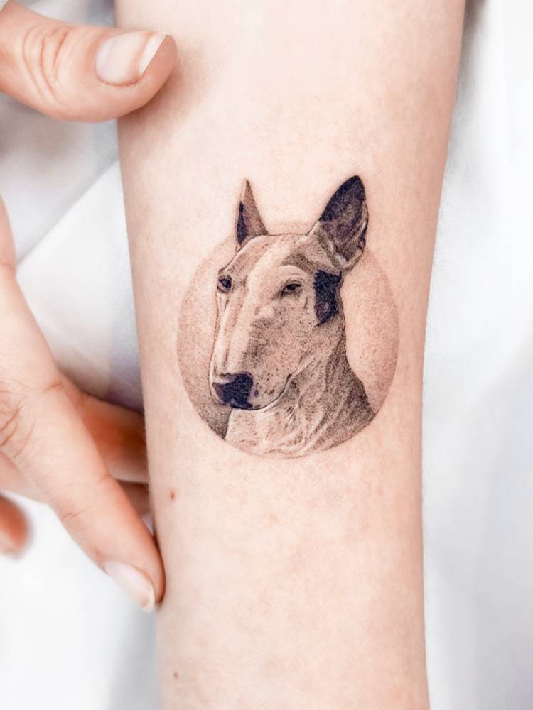 Micro-realistic Bull Terrier portrait tattoo done on the wrist.
