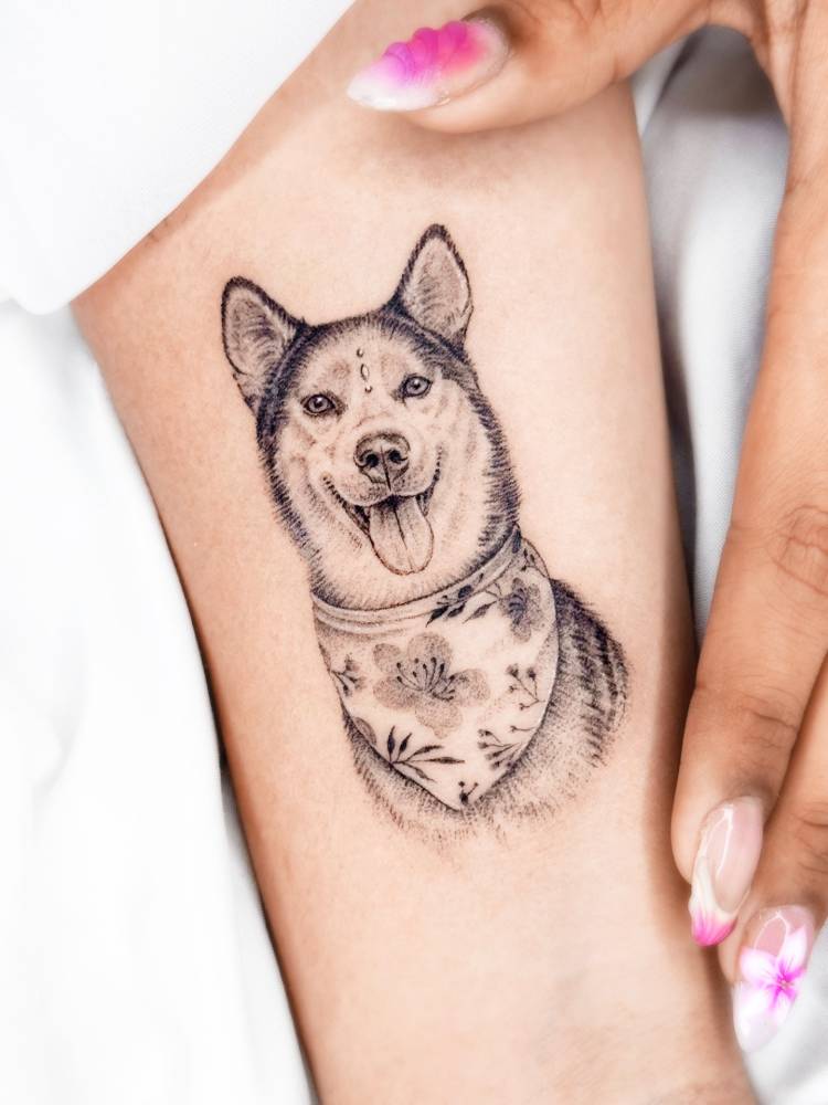 Husky portrait tattoo in micro-realism located on the inner forearm.