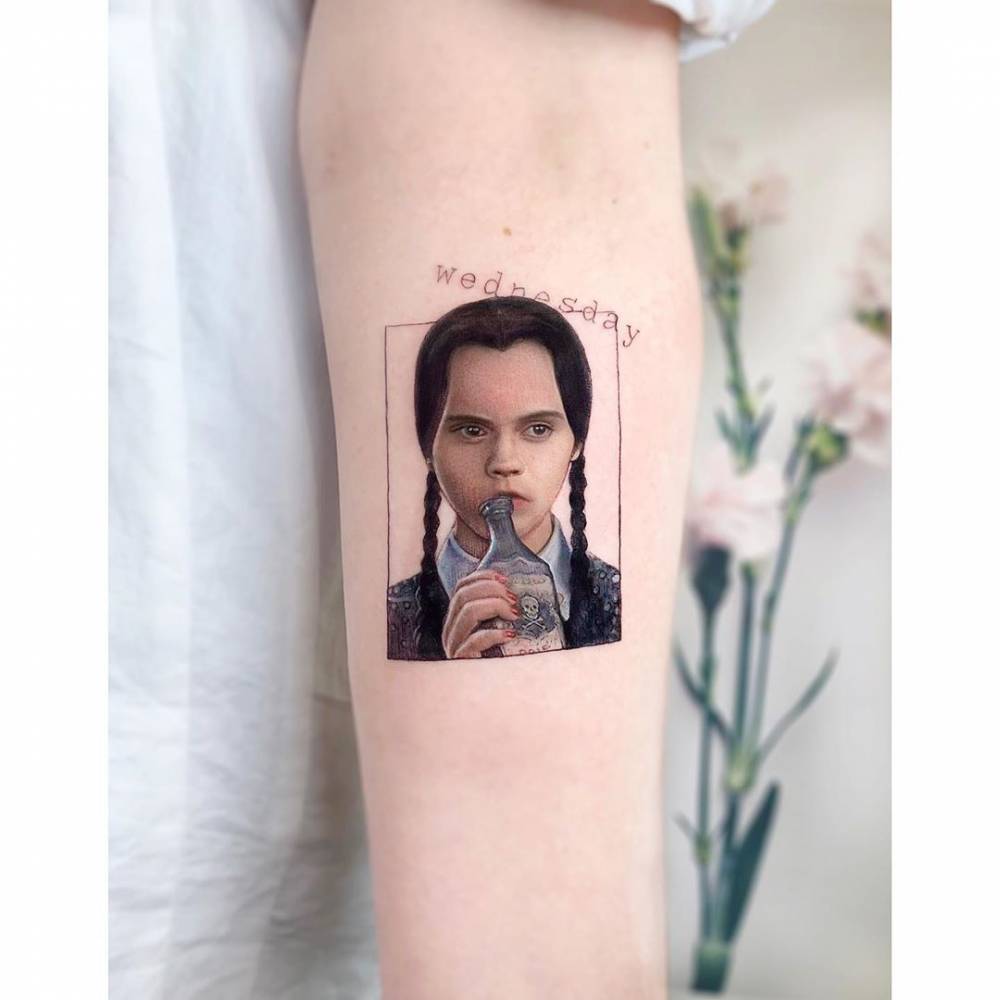Wednesday Addams portrait tattoo.