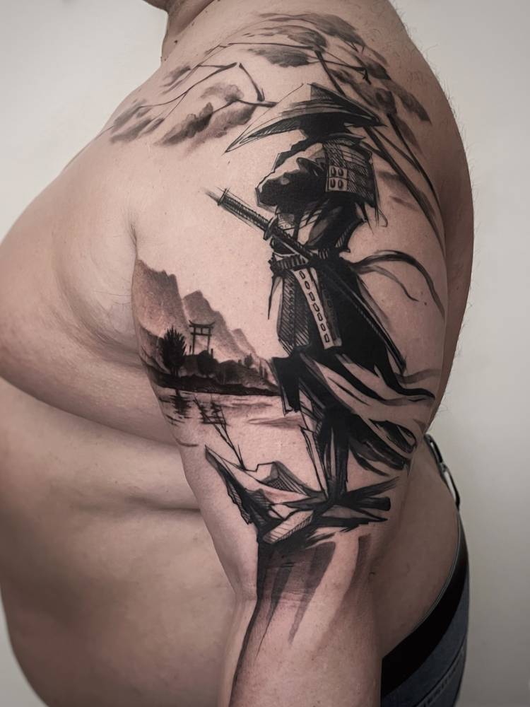 Samurai tattoo placed on the upper arm, done in blackwork style.