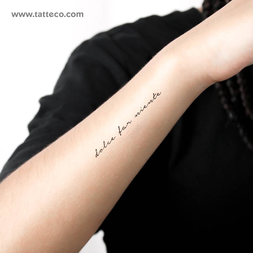 "Dolce far niente" temporary tattoo located on the wrist.