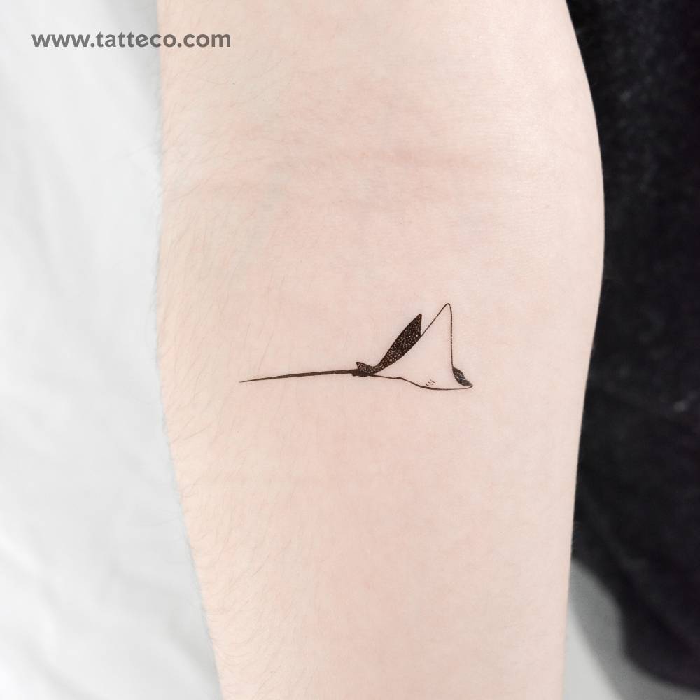 Spotted eagle ray temporary tattoo located on the inner forearm.