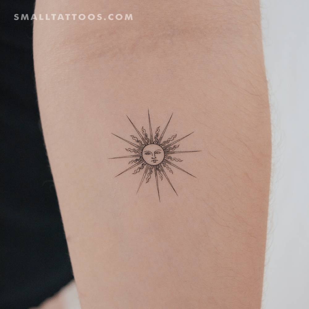 Inti sun temporary tattoo located on the inner forearm.