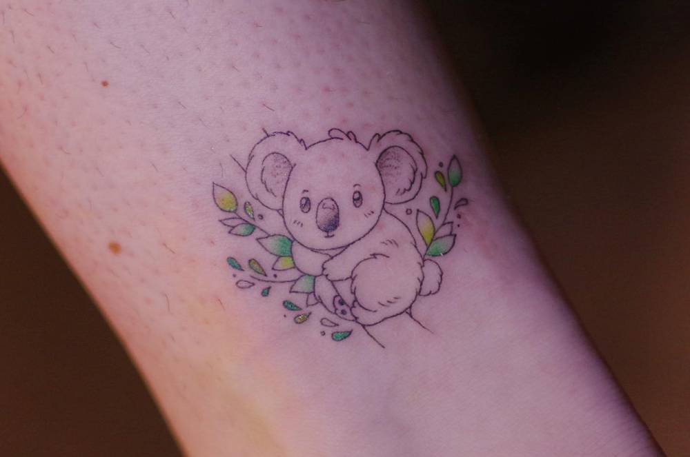 Cute koala tattoo in illustrative style placed on the ankle.