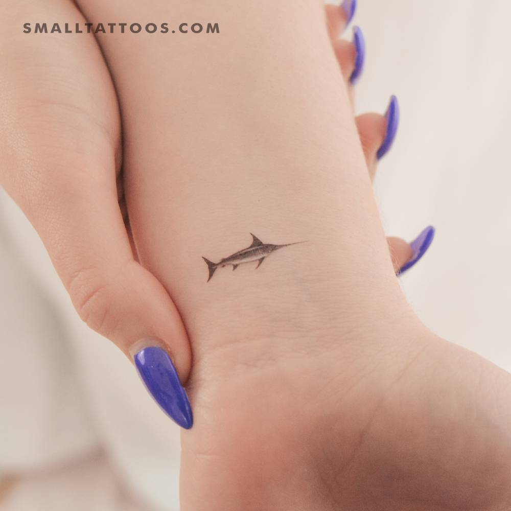 Micro-realistic style swordfish temporary tattoo located on the wrist.