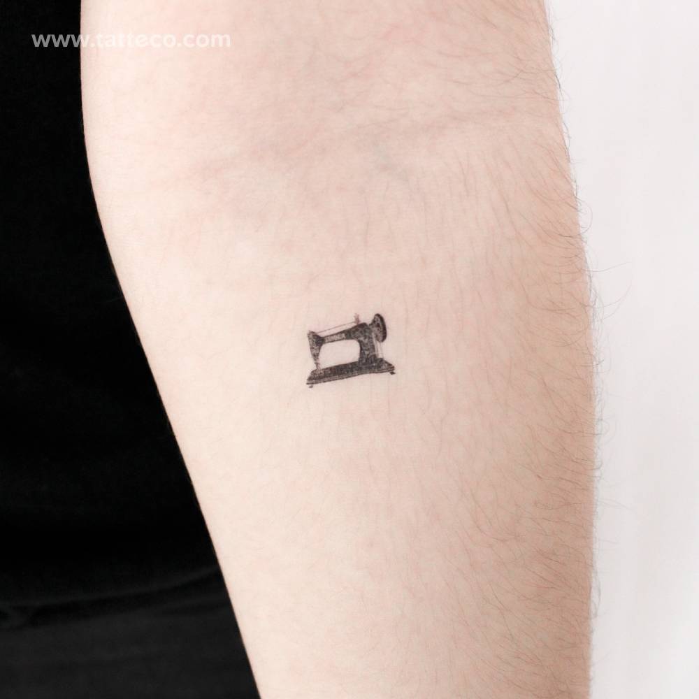 Little sewing machine temporary tattoo placed on the inner forearm.
