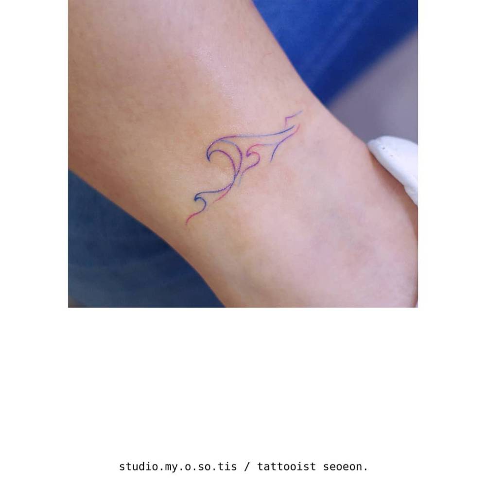 Spectrum wave tattoo located on the ankle.