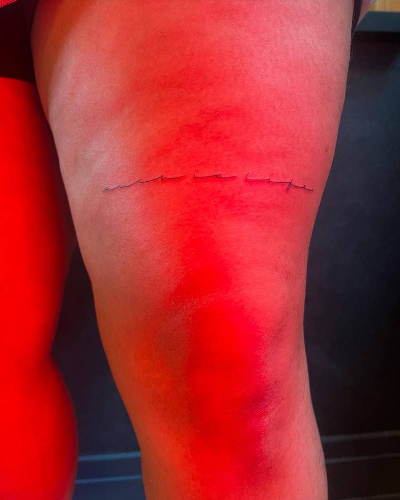 "Such is life" lettering tattoo in handwritten font.