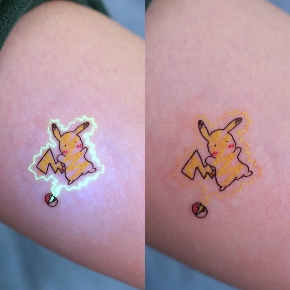 UV ink Pikachu tattoo done on the inner arm.