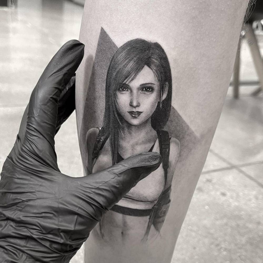 Tifa Lockhart- Final Fantasy - tattooed on the calf.