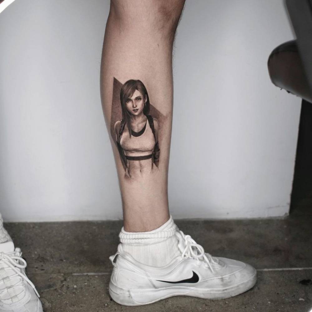 Tifa Lockhart- Final Fantasy - tattooed on the calf.