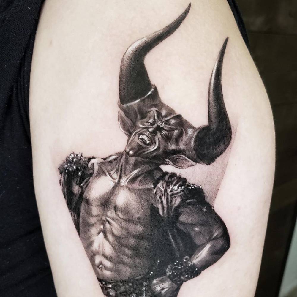 Darkness from the movie “Legend“ tattooed on the upper arm.