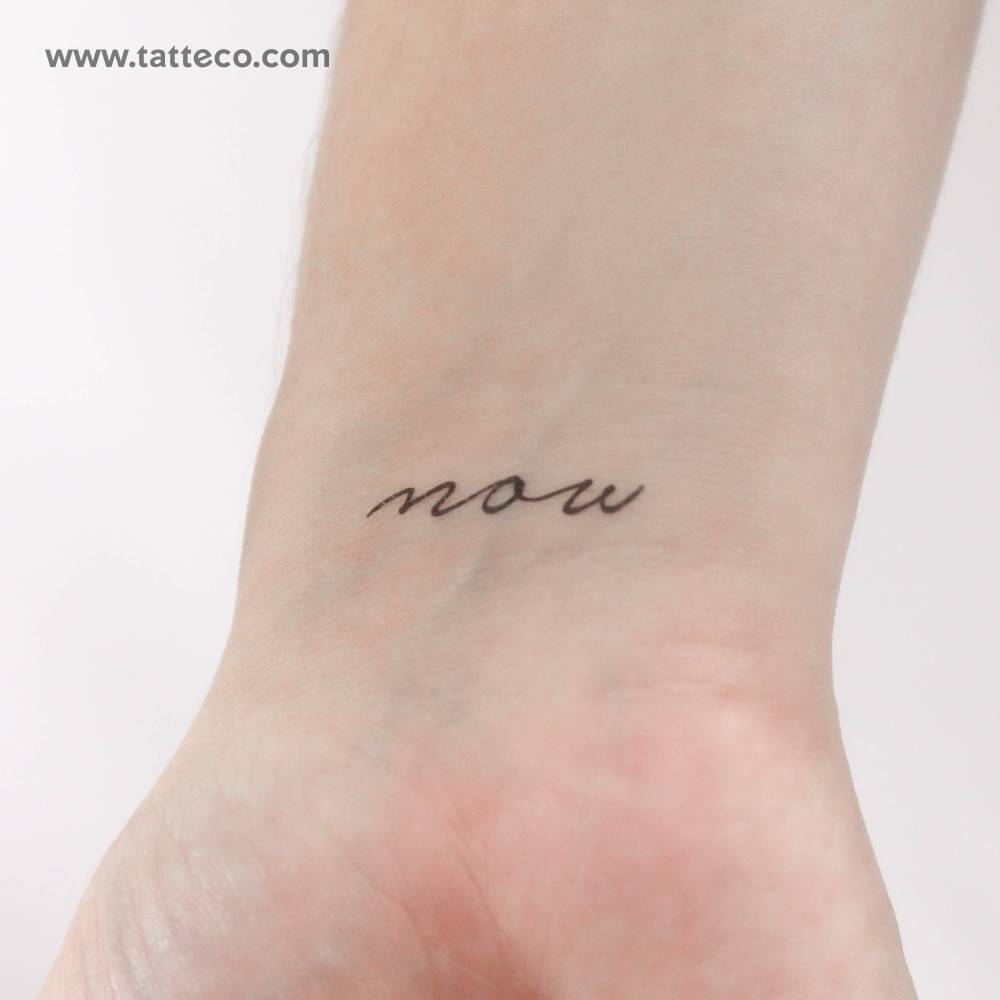 Small handwritten font word "now" temporary tattoo.