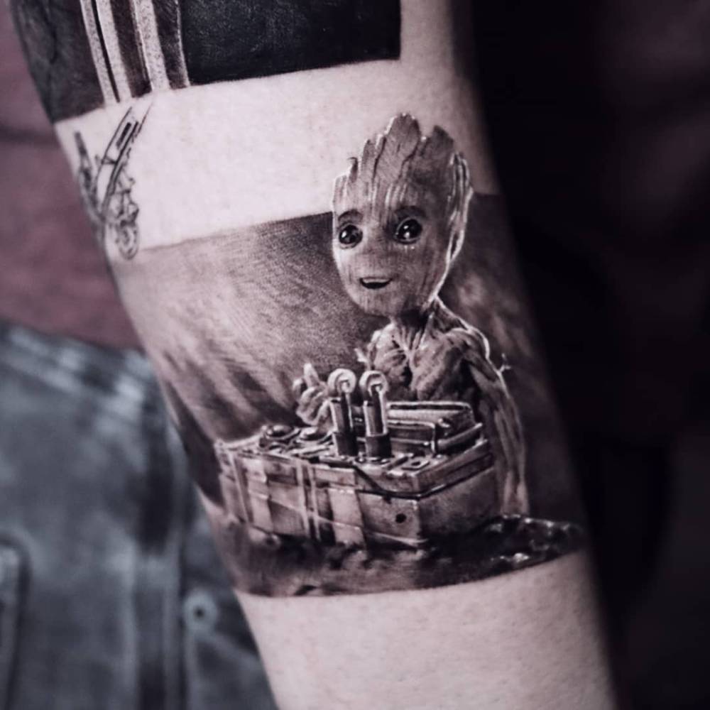 Groot tattoo in micro-realism located on the forearm.