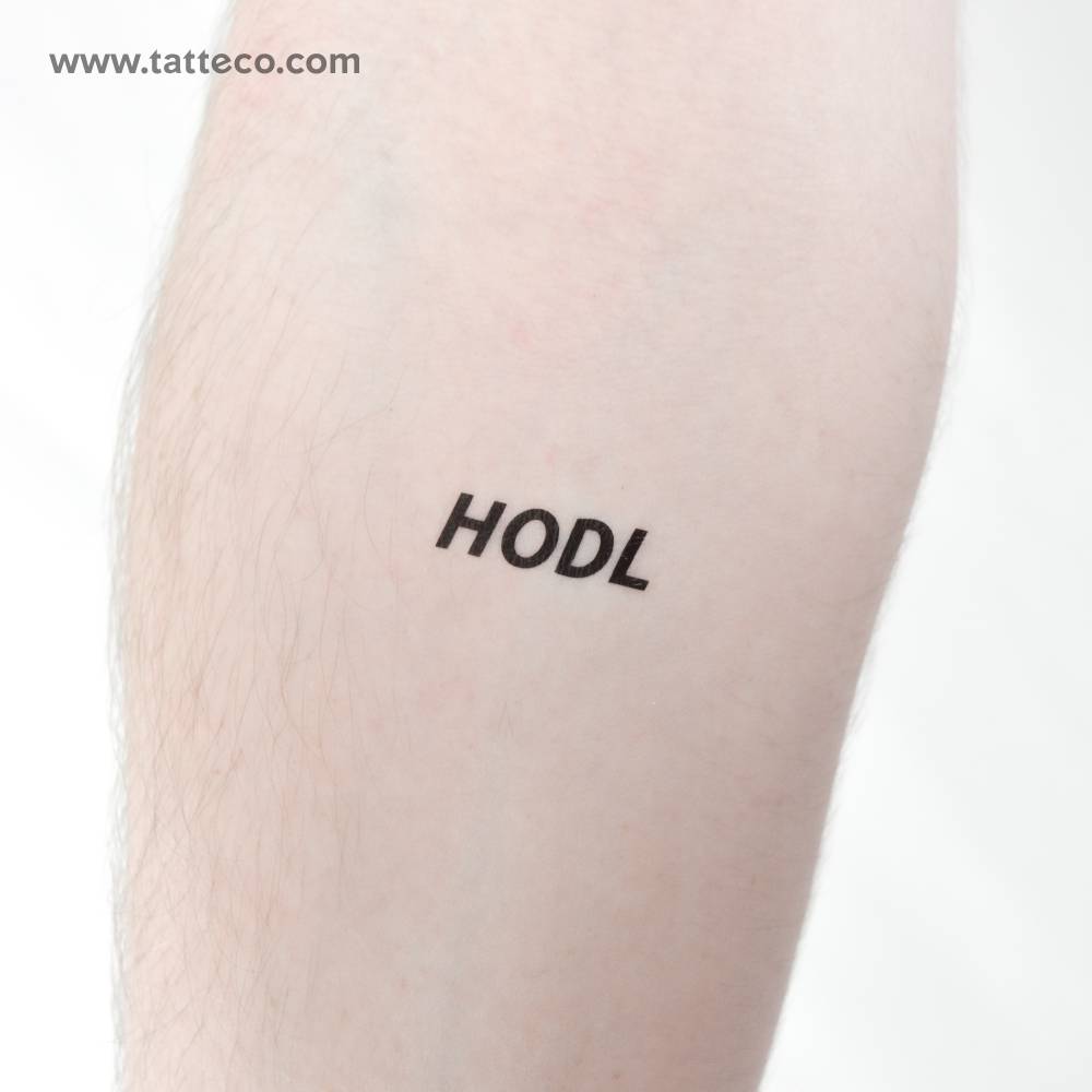 HODL temporary tattoo located on the inner forearm.