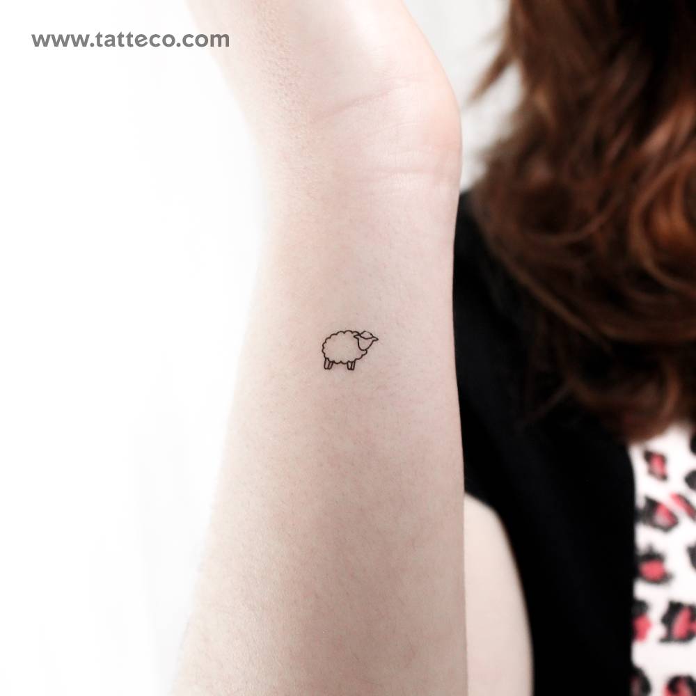 Tiny minimalistic sheep temporary tattoo placed on the wrist.