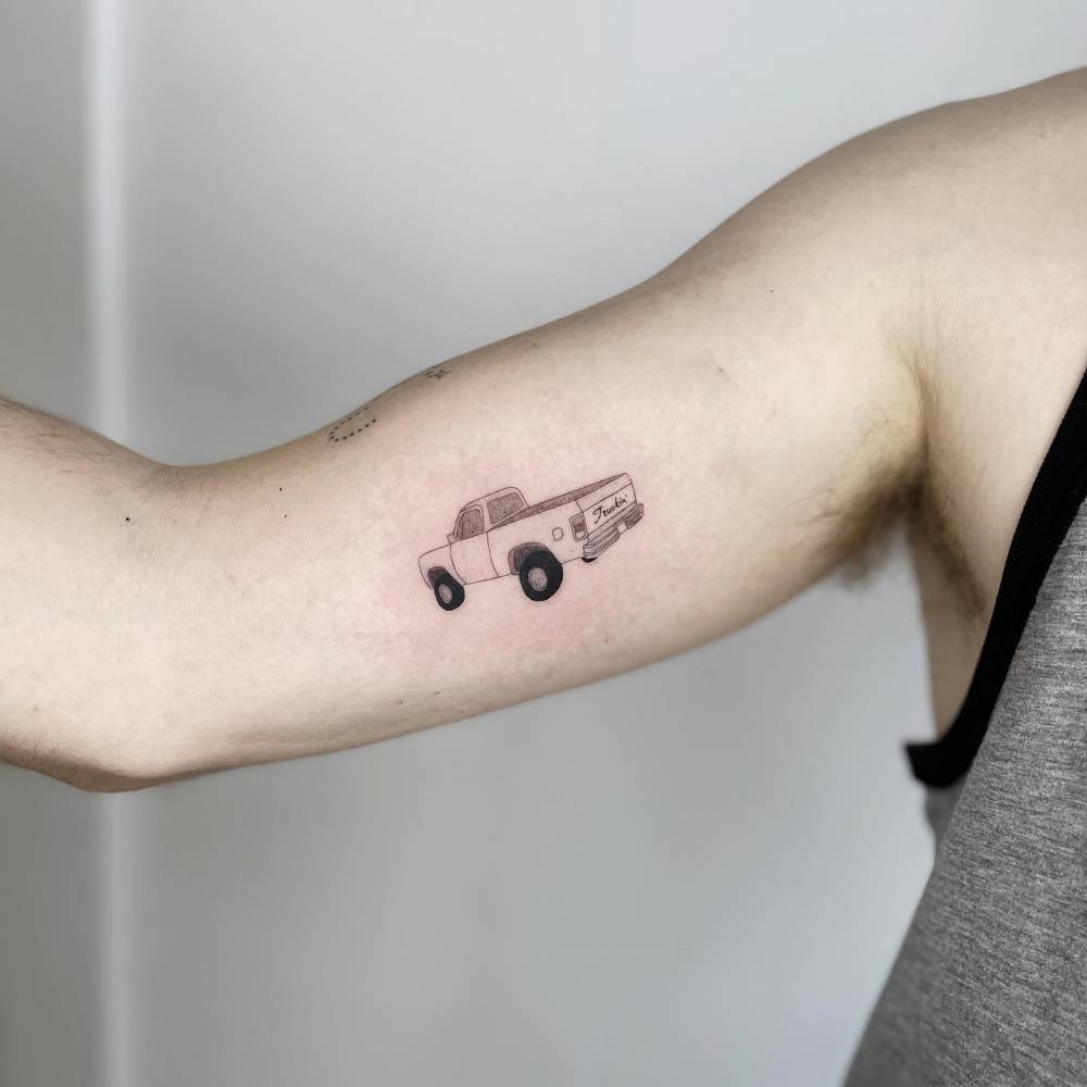 Dodge Ramcharger tattoo located on the inner arm.