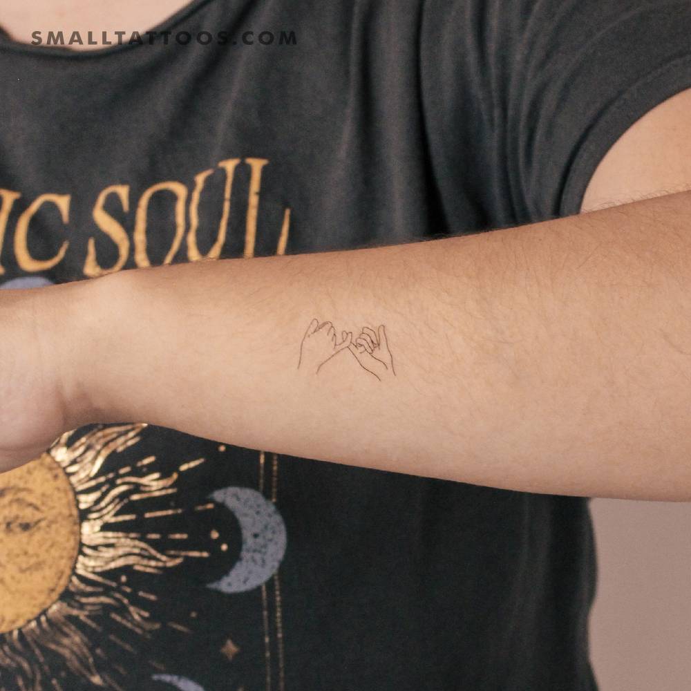 Small pinky swear temporary tattoo done on the wrist.