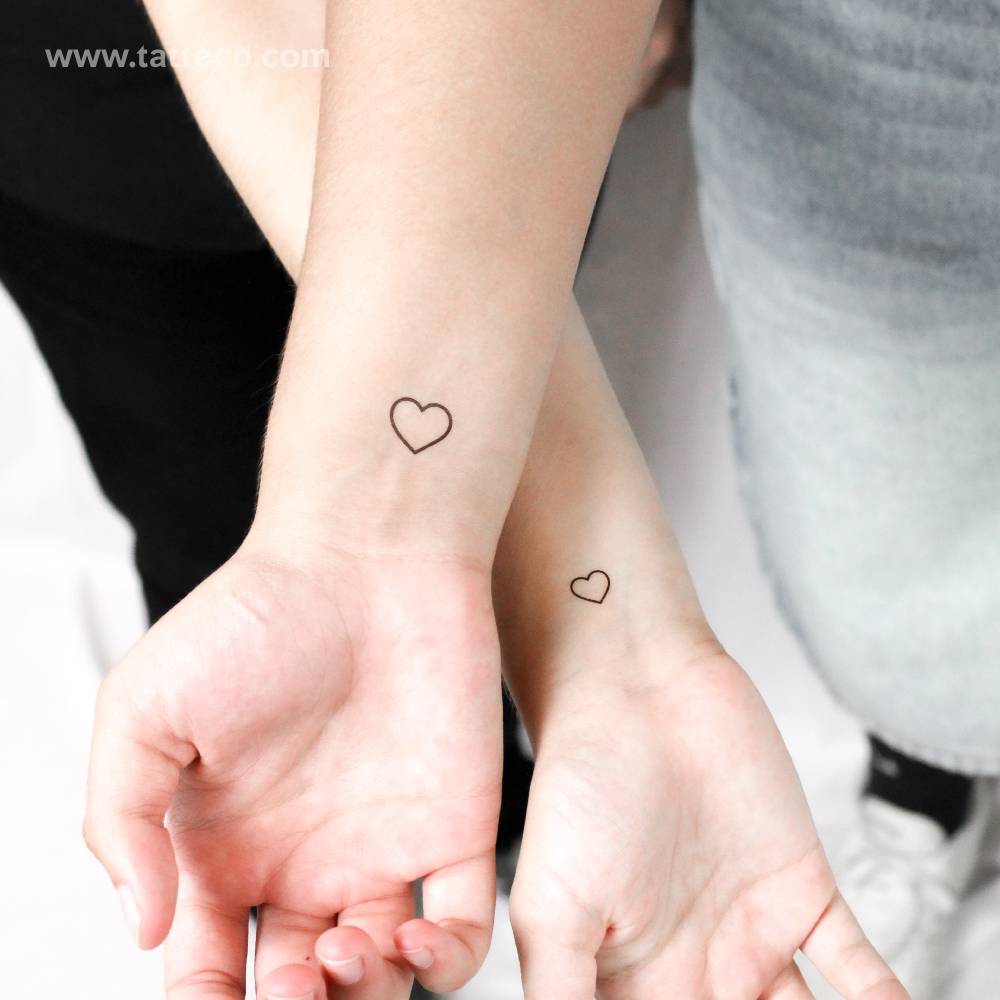 Matching minimalistic hearts temporary tattoo for best friends.