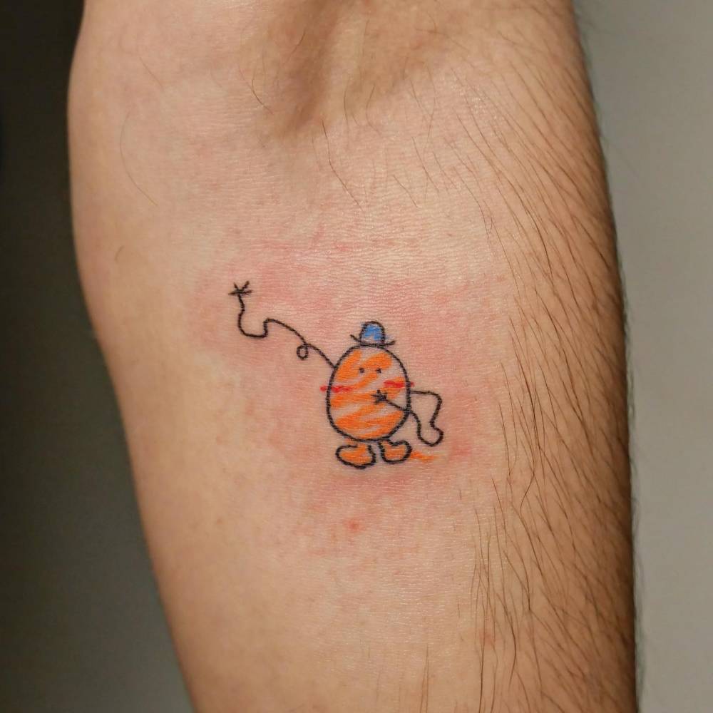 Cartoon style Mr. Potato Head tattoo located on the inner forearm.