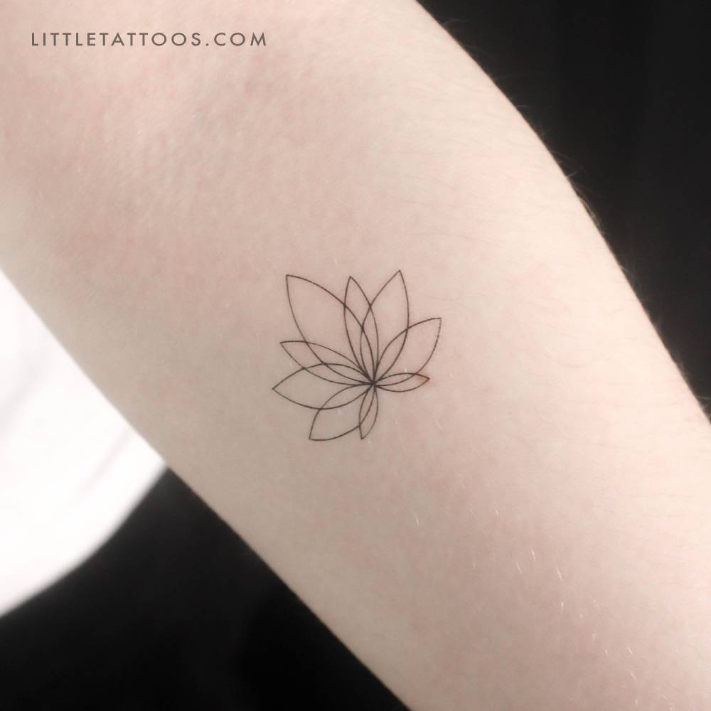 Fine line style lotus flower temporary tattoo located on the inner forearm.