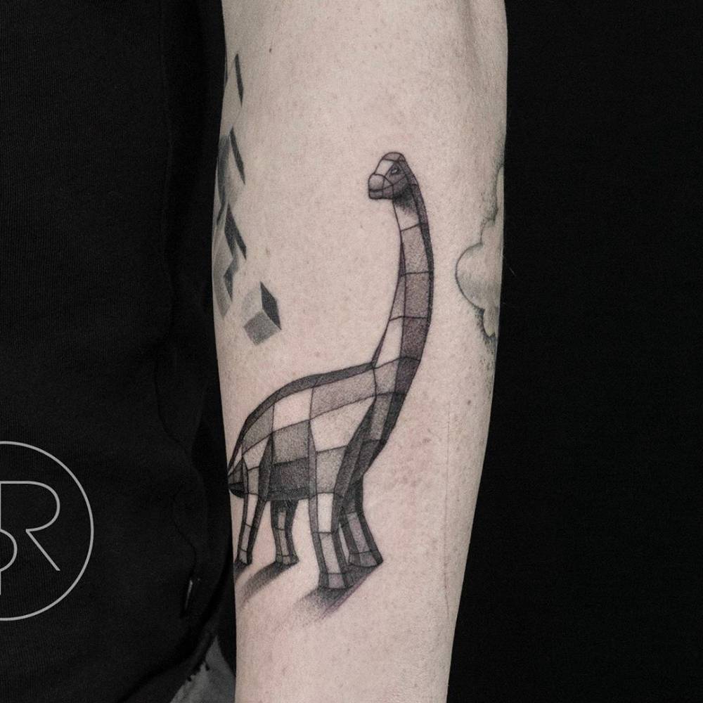 Brontosaurus tattoo in geometric style located on the forearm.
