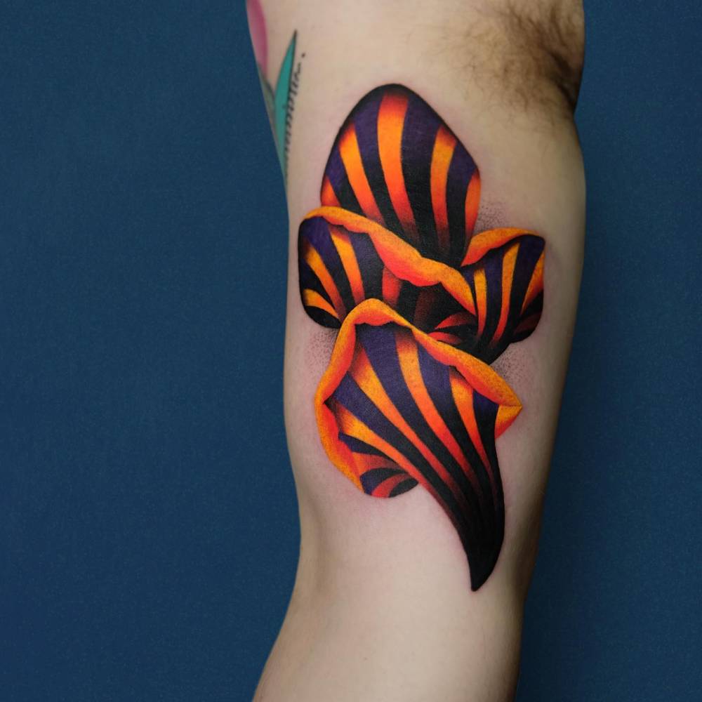 Contemporary style mushrooms tattoo placed on the inner arm.