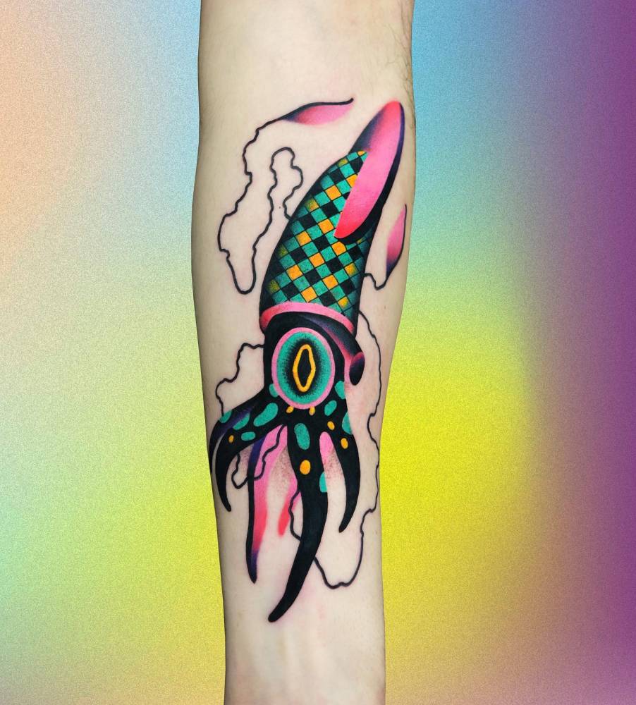 Squid tattoo located on the inner forearm, pop art style.