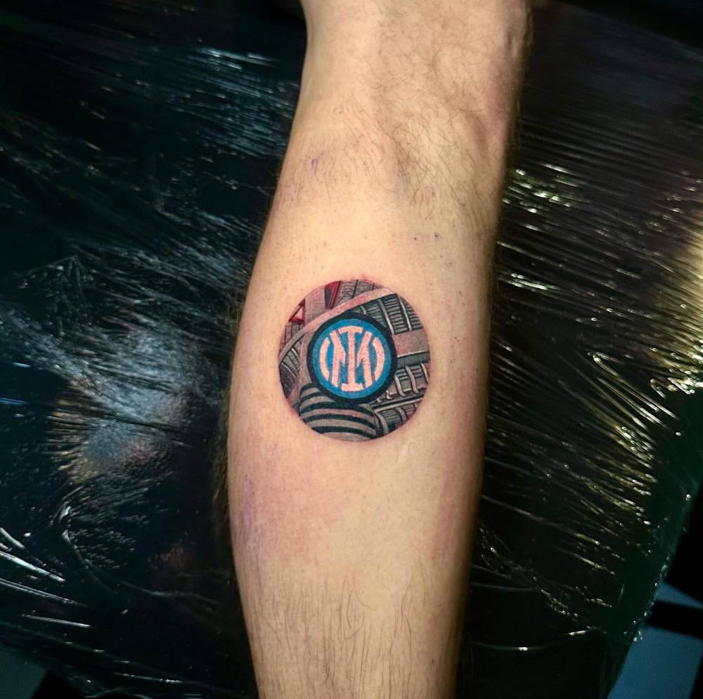 Inter Milan tattoo in micro-realism located on the calf.