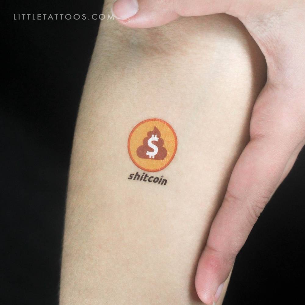 Shitcoin temporary tattoo located on the inner forearm.