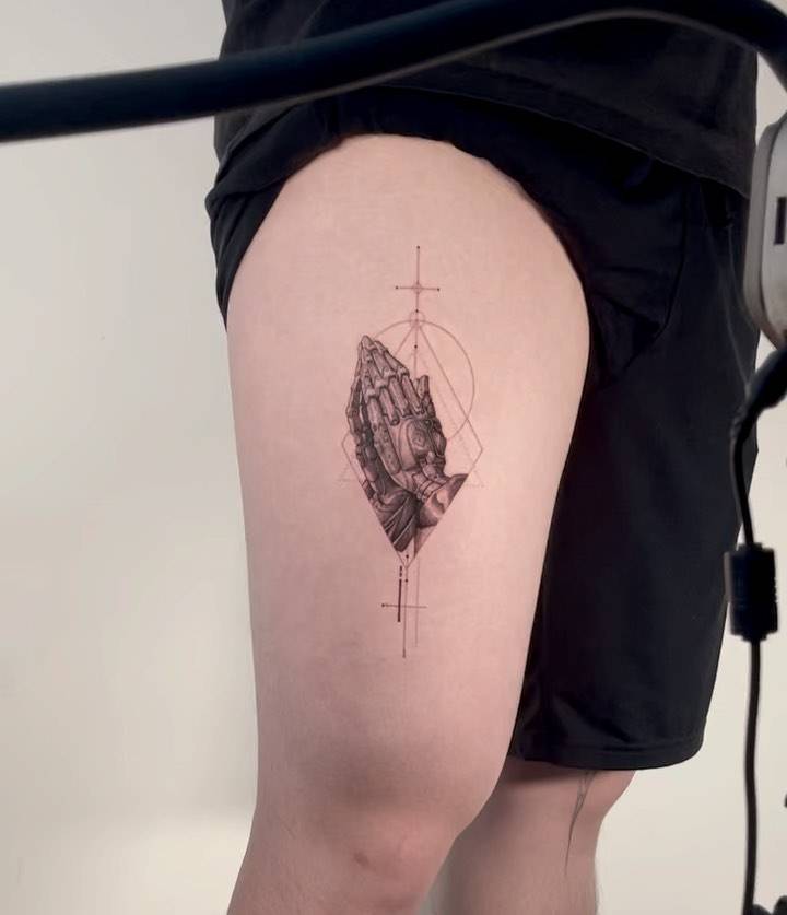 'Praying Hands' tattoo, original design by Viktor Crookdlg.