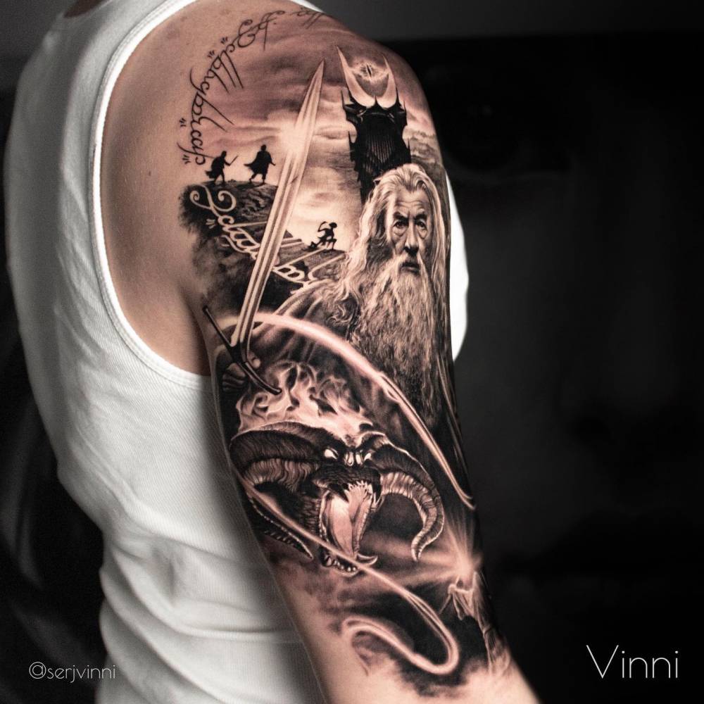 Lord of the rings half sleeve tattoo, black and grey style.
