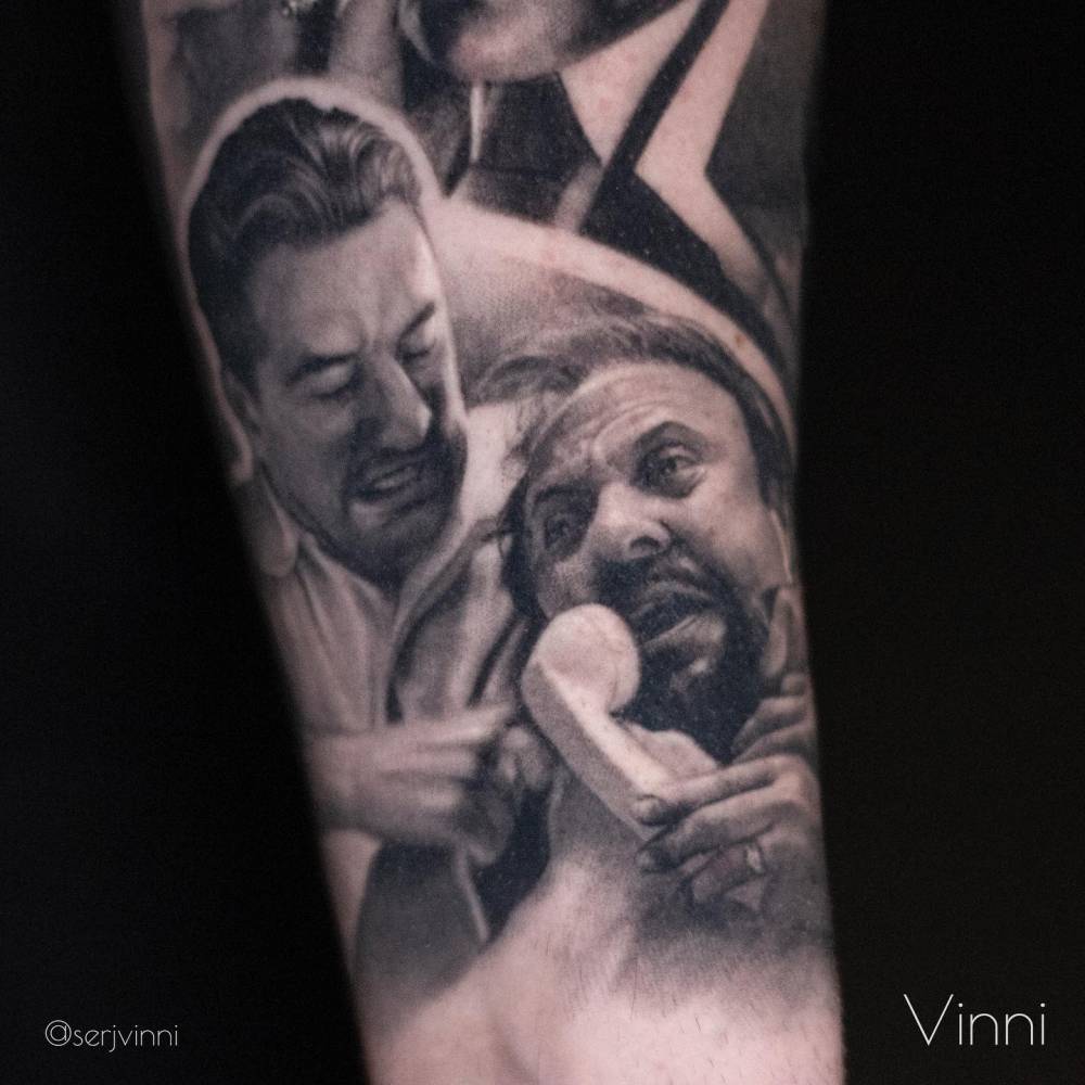 Goodfellas themed forearm tattoo, black and grey style.