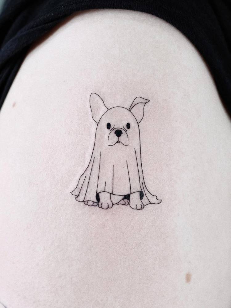 Illustrative style ghost dog tattoo placed on the upper arm.