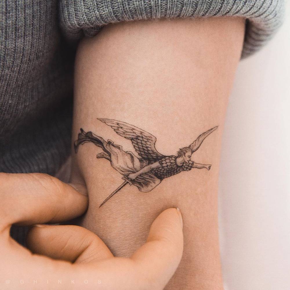Angel tattoo done with a single needle
