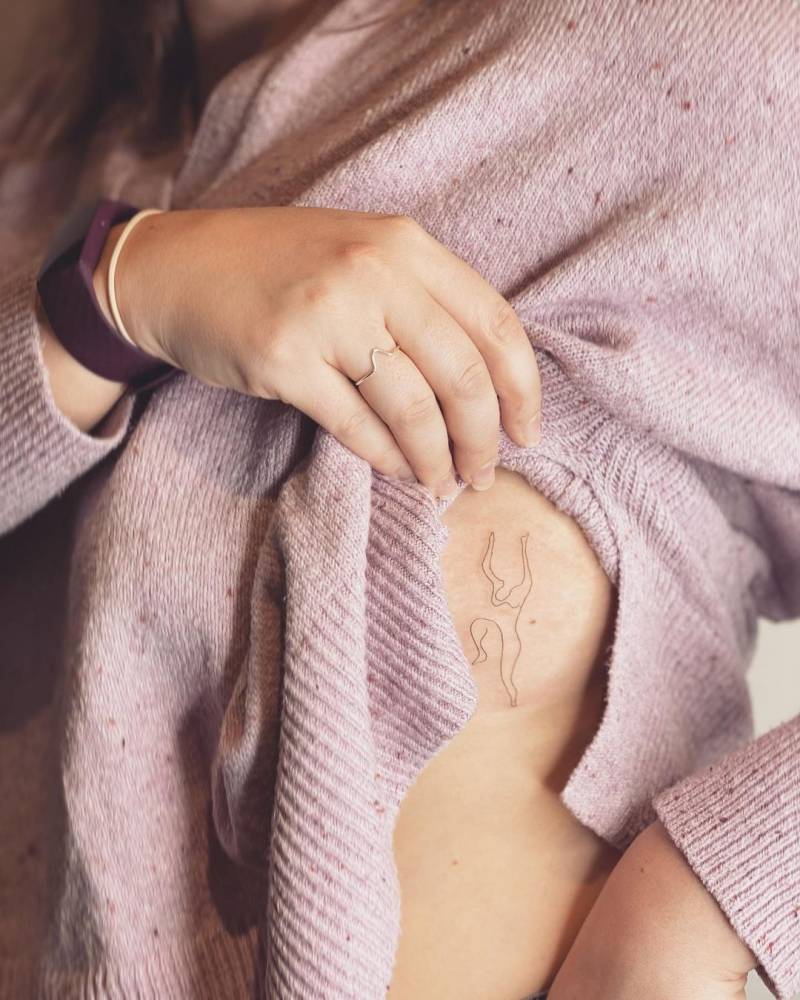 Picasso's dancer tattooed on the side boob.