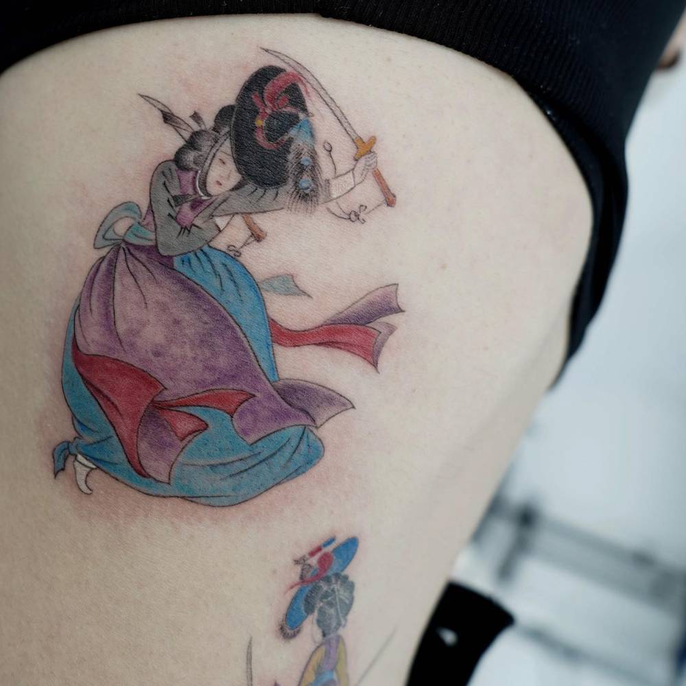 Sword dance tattoo located on the rib.