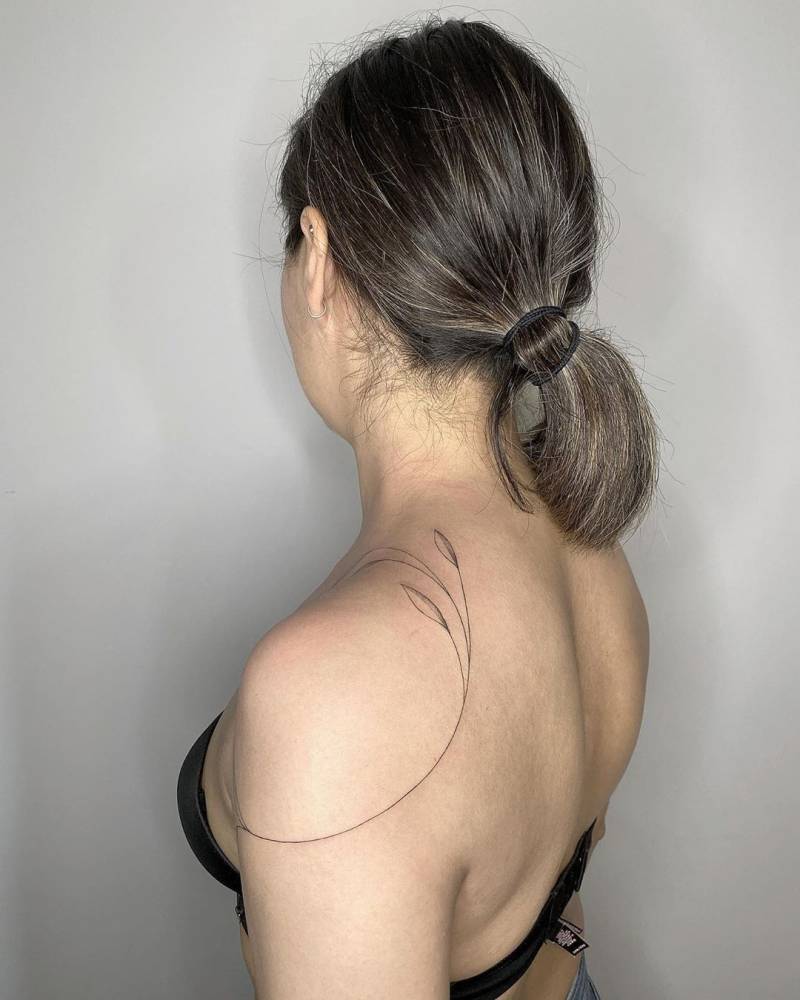 Leaves tattoo around the shoulder