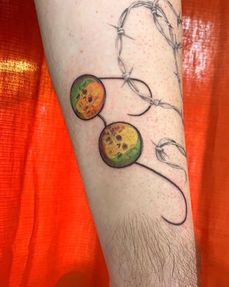 Eyeglasses tattoo on the inner forearm