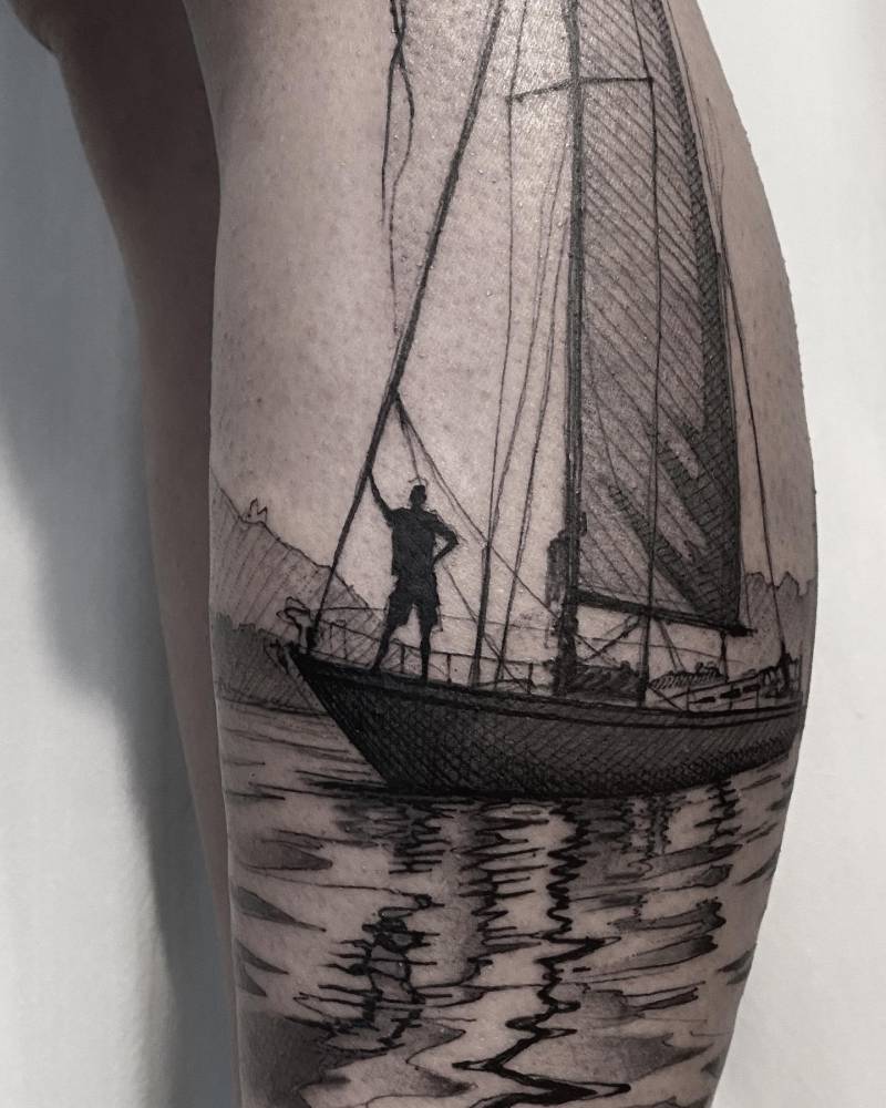 Sketch work style sailboat tattoo located on the calf.
