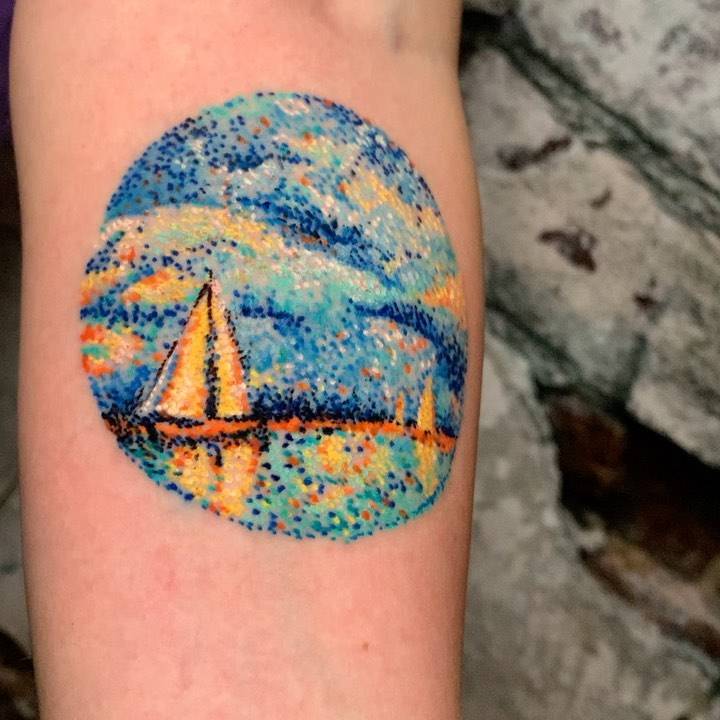 Sailboat tattoo on the inner forearm