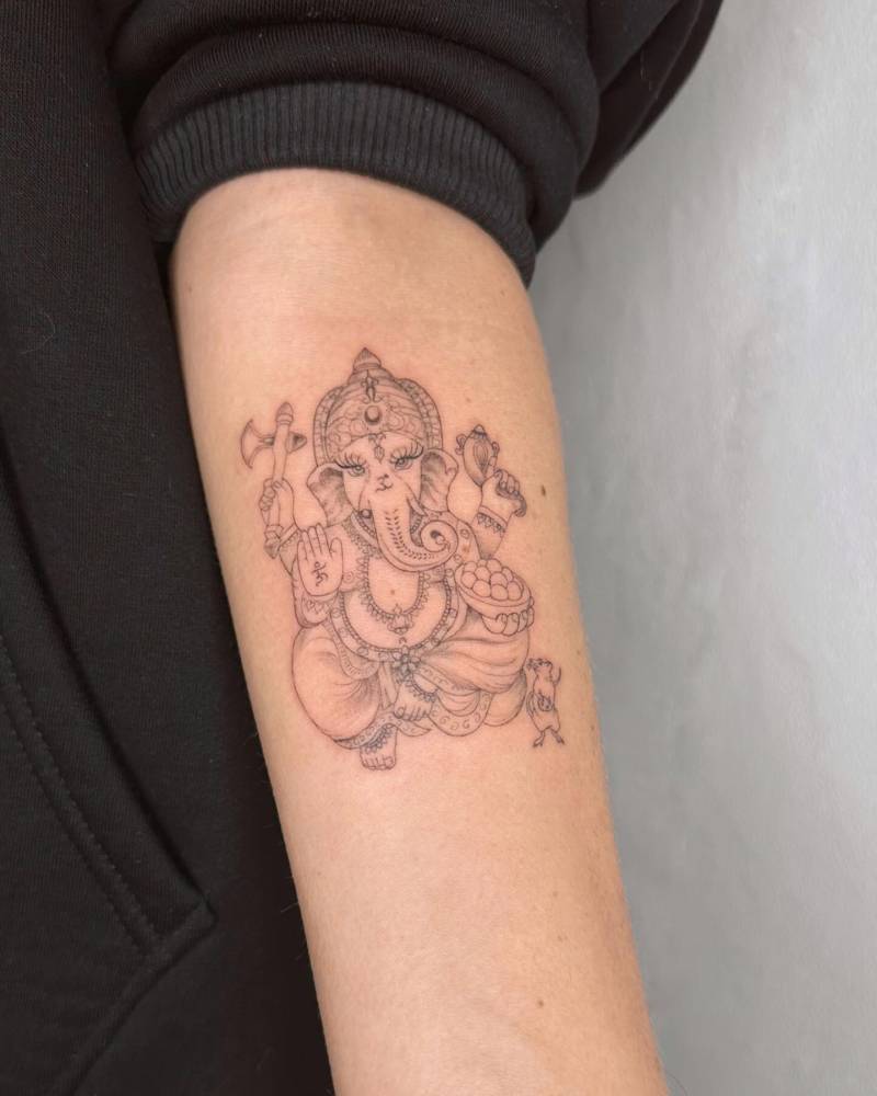 Ganesha tattoo located on the inner forearm.